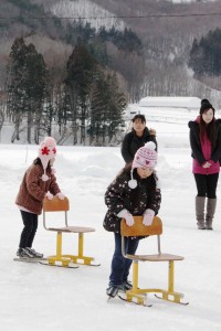 Kids are enjoying a fun day at an outdoor ice skating rink in Kawamata-machi, Fukushima prefecture.