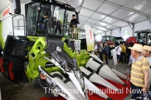 The venue full of many large-sized agri-machinery (on July 6, 2023, in Obihiro City, Hokkaido)