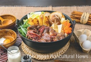 Sukiyaki with Kuroge-brand wagyu cocked in smoked-soy-sauce-based sukiyaki sauce and served with raw egg and yogurt